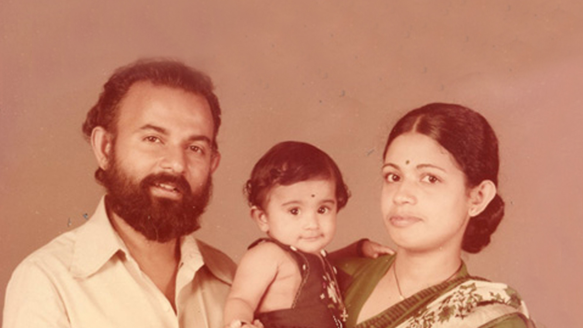 With his wife Jolly and daughter Meera